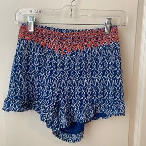 Frilled blue and orange shorts